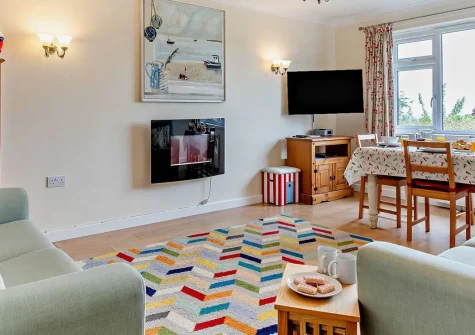 Sea Escape, Widemouth Bay is a charming two-bedroom coastal retreat with stunning sea views and direct beach access. Enjoy a spacious open-plan lounge, modern kitchen, and enclosed garden - perfect for creating lasting family memories by the sea.