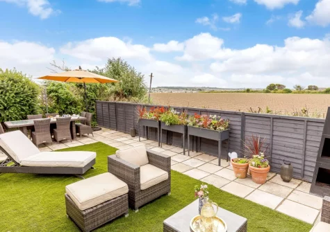 The garden, alfresco dining & outdoor sitting area at Sea Esta, Phillack