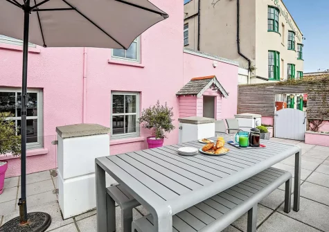 The patio, barbecue & alfresco dining area at Sea Foam House, Ilfracombe
