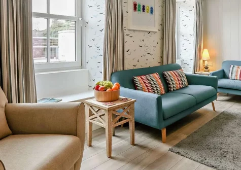 Sea Foam House, Ilfracombe is a spectacular four-bedroom harbour retreat with breathtaking sea views. Experience authentic nautical charm, period features, and a private terrace with BBQ, perfectly positioned for exploring Devon's coast.