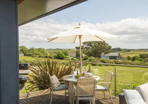 The decked terrace, barbecue e & alfresco dining area at Sea Gem, Morcliff, St Agnes