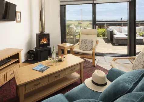 Sea Gem, Goonvrea is a stunning eco-lodge with countryside and sea views in Chapel Porth's World Heritage setting. Enjoy cedar cladding, modern amenities, a wood burner, and a magnificent deck, perfectly positioned for exploring Cornwall's treasures.