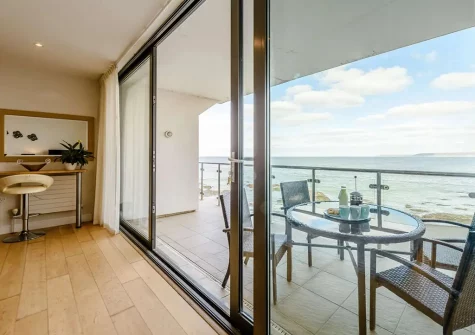 The balcony & alfresco dining area at Sea Haven, Westward Ho!