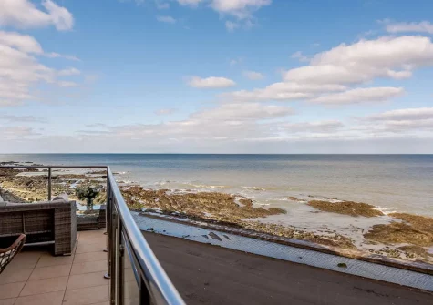 Enjoy far reaching sea views from the balcony & outdoor sitting area at Sea Haven, Westward Ho!