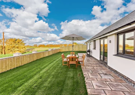 The patio, babecue, alfresco dining area & garden at Sea Haze Number 6, Westward Ho!