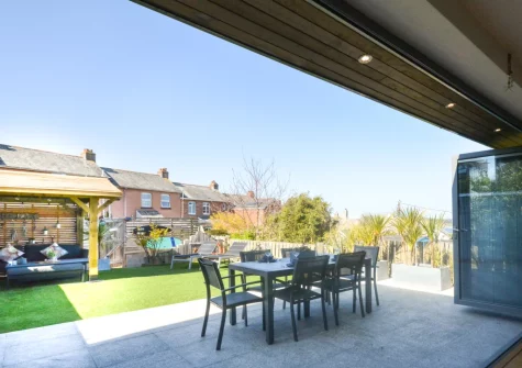 The patio, alfresco dining area, lawn, gazebo & outdoor sitting area at Sea Renity, Padstow