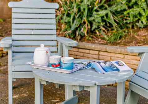 The shared patio, barbecue & outdoor sitting area at Sea Sparkle, Newquay