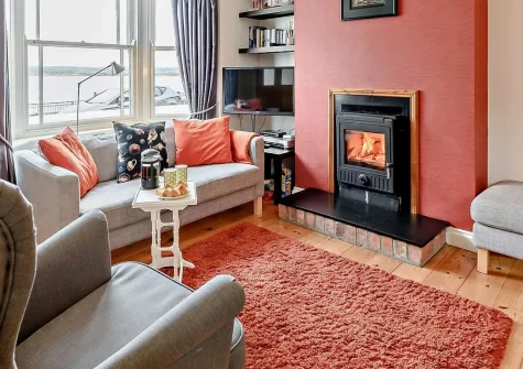 Sea Spray, Appledore is a charming 3-bedroom waterfront cottage boasting stunning estuary and ocean views. Enjoy direct coastal path access, private parking, and proximity to quayside dining and shops, making it perfect for memorable seaside escapes.