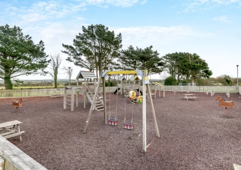 The shared children's play area at Seabreeze Retreat, St Merryn