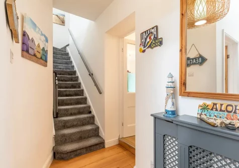 The entrance hall & stairs up to the first floor at Seadrift, Westward Ho!