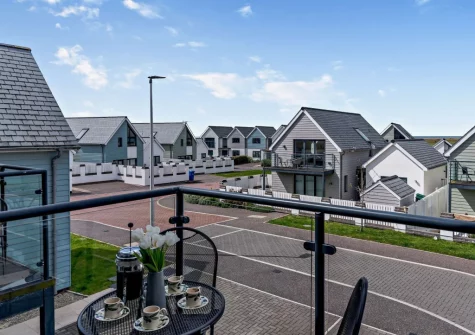 The front balcony & outdoor sitting area at Seaglass, Westward Ho!