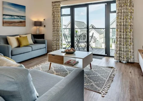 Seaglass, Westward Ho! is a stylish reverse-level home with spectacular sea views, private hot tub, and direct beach access. Perfect for couples and families seeking coastal charm with modern amenities and endless North Devon adventures.