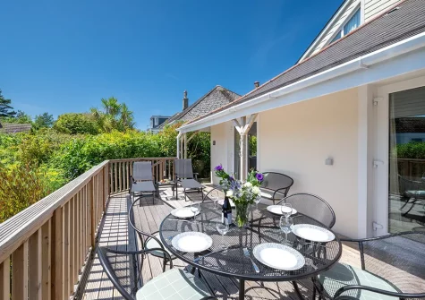 The decked patio, alfresco dining & outdoor sitting area at Seahorses, Fowey