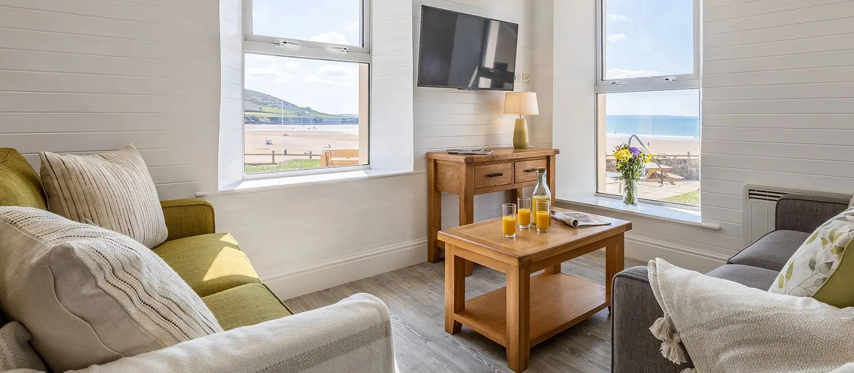 Sealawn, Croyde is a stunning beachfront apartment with direct beach access, panoramic sea views, and flexible sleeping for six guests. Perfect for families seeking an authentic North Devon coastal experience in this renowned surfing village.