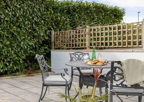 The patio & alfresco dining area at Seas The Day, Brixham