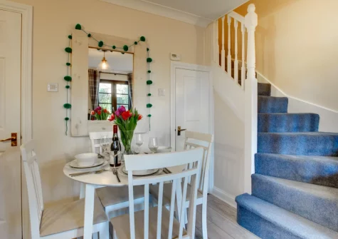 The dining area & stair up to the first floor at Seashells, Padstow
