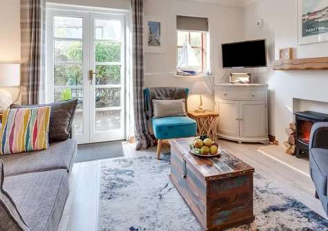 Seashells, Padstow is a stylish two-bedroom cottage just steps from the historic harbour. Enjoy multiple sun-soaked gardens, contemporary coastal décor, and easy access to North Cornwall's beaches and attractions for memorable holidays.
