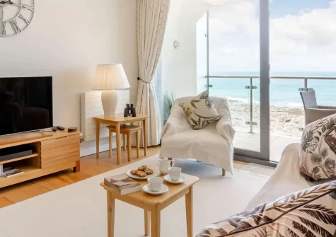 Seaside Apartment, Westward Ho! is a stunning duplex retreat with spectacular ocean views and private balcony. Enjoy contemporary living, magnificent sunset watching, and direct beach access for unforgettable family coastal holidays.