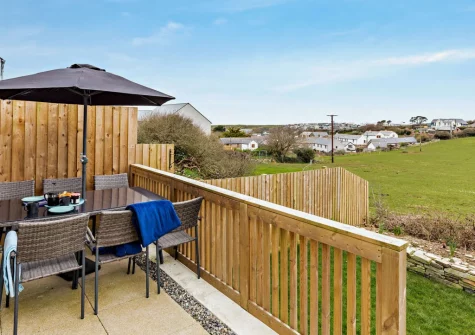 The elevated decked terrace, barbecue & alfresco dining area at Seaside Retreat, Crantock