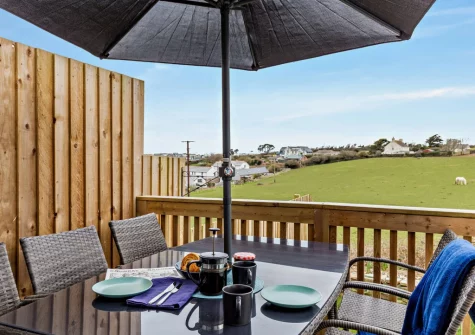 The elevated decked terrace & alfresco dining area at Seaside Retreat, Crantock