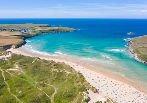 Crantock's beautiful sandy beach is surrounded by rolling dunes, great for kids to explore