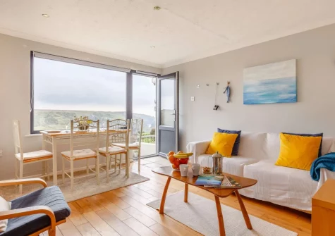 The living & dining area at Seaspray Cottage, Mullion Cove