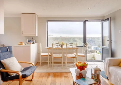The living & dining area at Seaspray Cottage, Mullion Cove