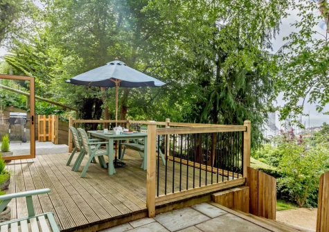 The decked patio, babecue & alfresco dining area at Seaview, Beer