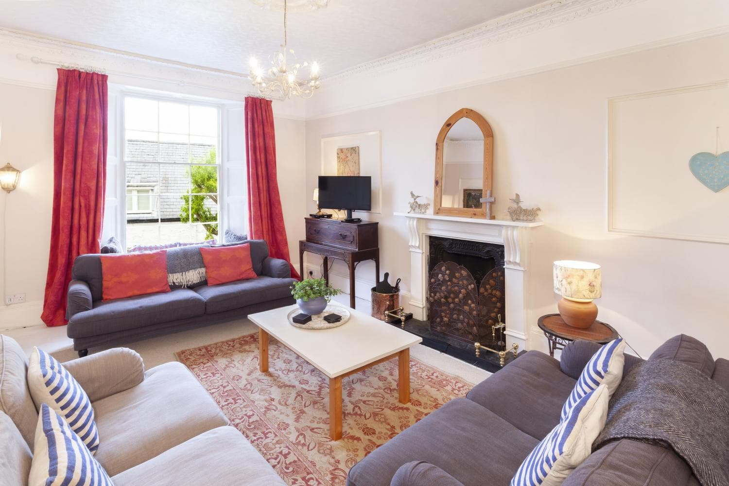 Seaview, Lynmouth is an elegant Grade II listed townhouse with character features & limited sea views. Spread over four floors it has four bedrooms (wo ensuite), dining kitchen, sitting room with fireplace & attractive decked garden. Footpath access only.