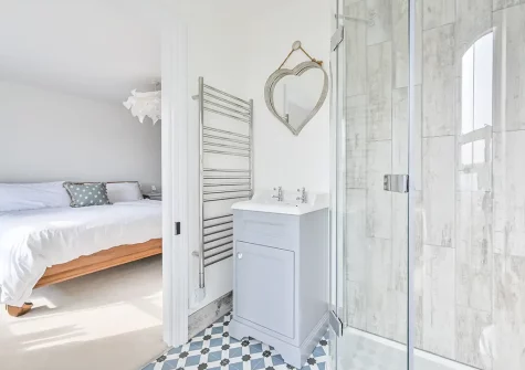 Bedroom #1 & en-suite shower room at Seawind, Looe