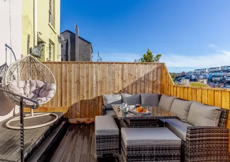 The decked patio & alfresco dining area at Ser A Mor, Brixham