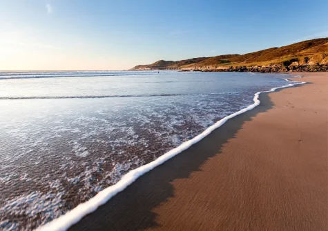 Nearby Woolacombe Beach renowned for its stretch of golden sand