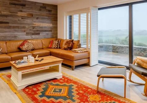 Old Farmhouse, Week Orchard is a beautiful six-bedroom country haven mixing historic character with modern luxuries. Enjoy a games room, sunken hot tub, sauna, & children's play area while being perfectly positioned to explore Cornwall's attractions.