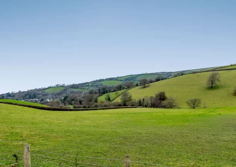 Enjoy far reaching countryside views when you stay at Shearing Shed, Combe Martin