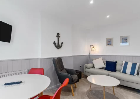 The open-plan living & dining area at Shells Shore, Sunnybeach Apartments, Paignton