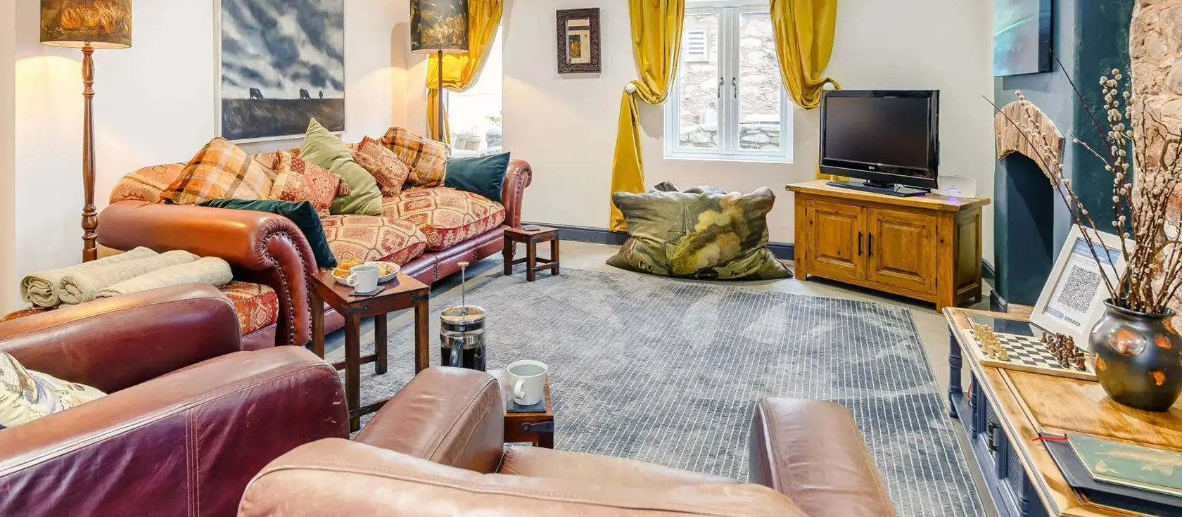 Shoestring Cottage, Lympstone offers luxury waterfront living with spectacular panoramic estuary views. Enjoy direct water access, enchanting outdoor spaces, and charming Devon village location perfect for creating unforgettable coastal memories.
