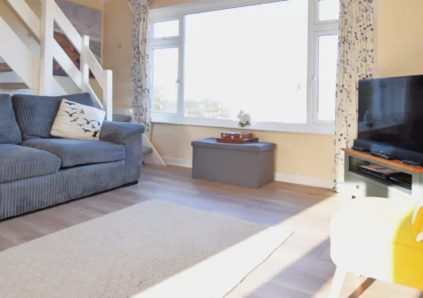 Shorelark, Porthtowan is a spacious three-bedroom house in a peaceful area with stunning sea views, an enclosed garden perfect for families and dogs, and the sands of Porthtowan Beach just a short stroll away on Cornwall's dramatic north coast.