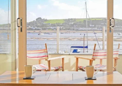 Step out onto the balcony, with sitting & alfreasco dining area