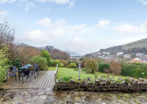The decked patio, alfresco dining area & garden at Silver Seas, Combe Martin
