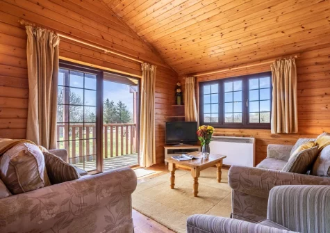 The living area at Sky Lark Lodge 7 at Clovelly Lakes, Higher Clovelly