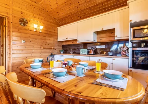 The kitchen & dining area at Sky Lark Lodge 7 at Clovelly Lakes, Higher Clovelly