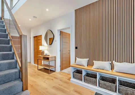The entrance hall & stairs to the first floor at Skybreak, Appledore