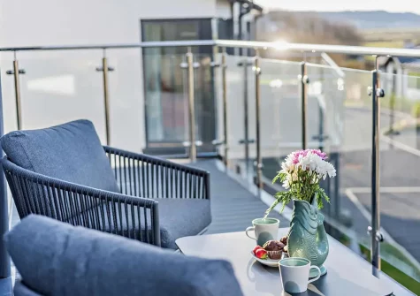 The balcony & outdoor sitting area at Skybreak, Appledore