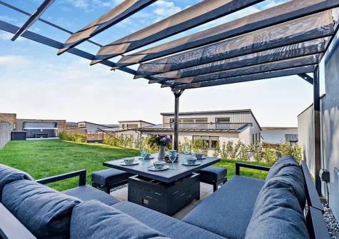 The rear garden & alfresco dining area at Skybreak, Appledore