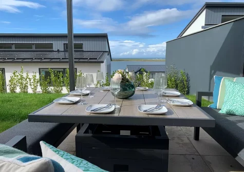 The rear garden & alfresco dining area at Skybreak, Appledore