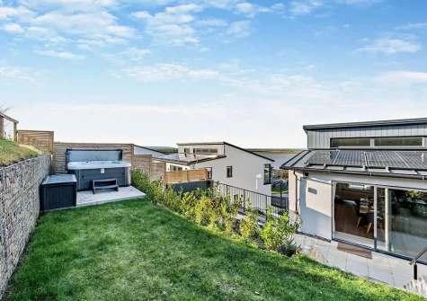 The rear garden & hot tub at Skybreak, Appledore