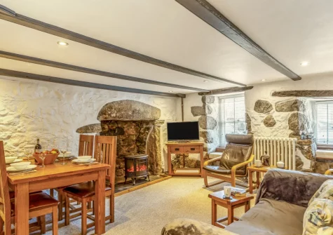 The living & dining area at Slipway Cottage, 8 Back Lane, St Ives