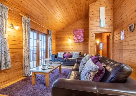 The living area at Snow Goose Lodge 16 at Clovelly Lakes, Higher Clovelly