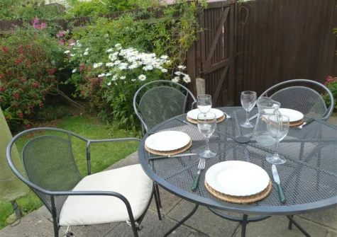 The patio, alfresco dining area & garden at Snowdrops, Beer
