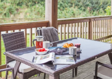 The decked terrace, barbecue & alfresco dining area at Snowy Owl, Winnard's Perch